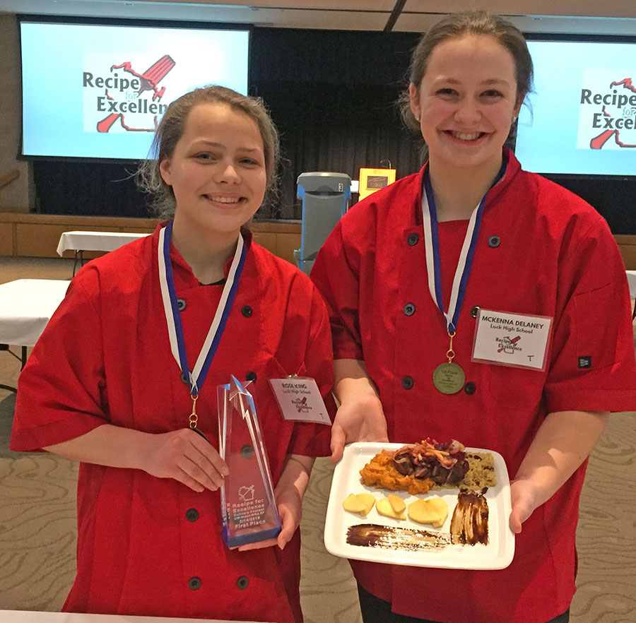 Luck High School students Rose King and Mckenna Delany with their winning dish