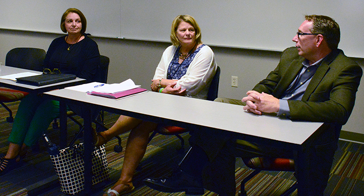 From left to right, retired Menomonie schools Superintendent Chris Stratton; Lisa Maas, vice president of human resources at Northeast  Wisconsin Technical College, Green Bay; and Timm Boettcher, president and chief executive officer at Realityworks, Eau Claire, take part in a panel discussion at the CTE Summit at UW-Stout.