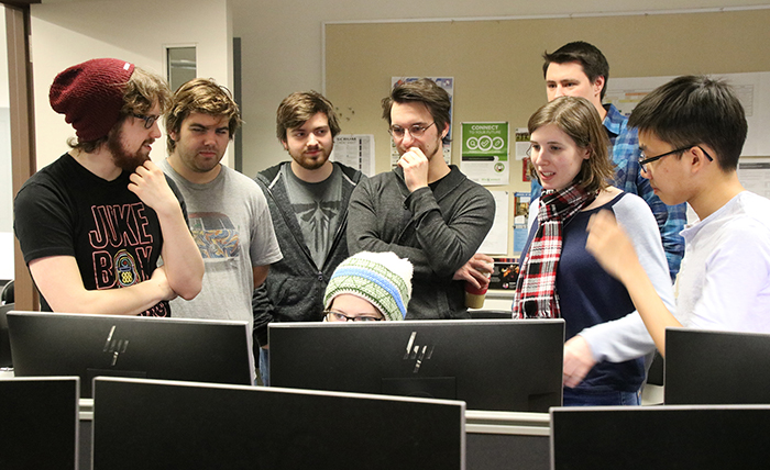 A group of seniors collaborate on a game design project at UW-Stout.