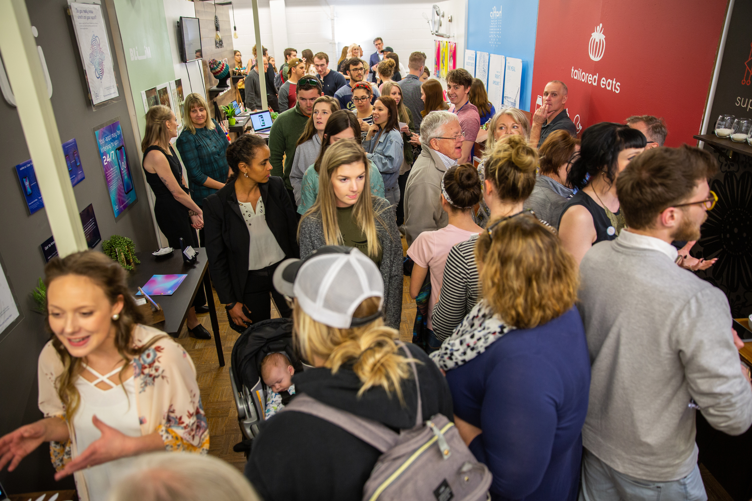 Students, community members and supporters mingle during one of Stout's public student art shows.