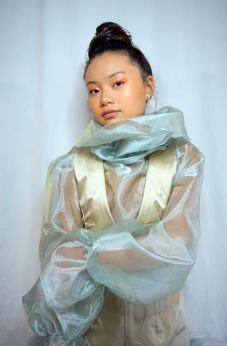 Faith Yang models a design from the senior collection by UW-Stout’s Angel Yang, an apparel design and development graduate. Faith Yang is Angel Yang’s sister.