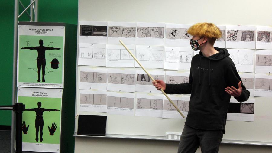 Student Joe Leider discusses ideas in the Animation Production class.