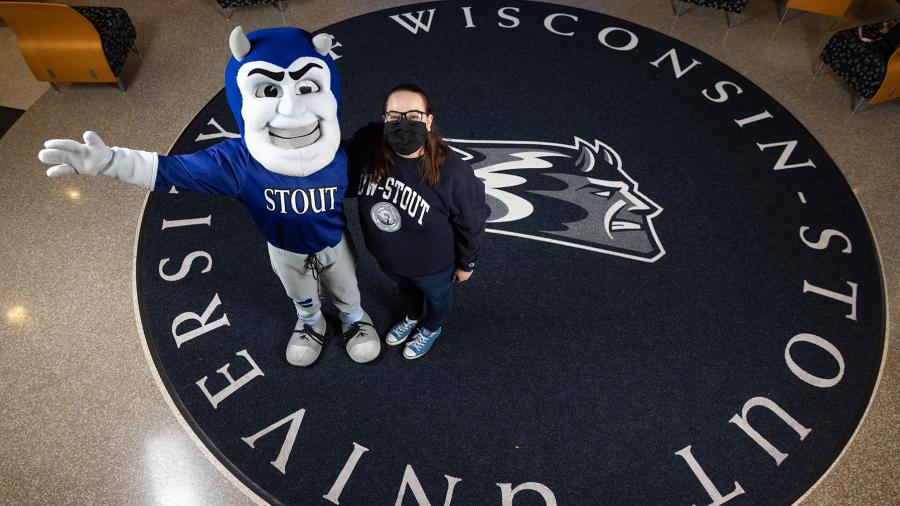 Kylie Anderson, a graduate student at UW-Stout, won a photo shoot with the mascot blaze as part of UW-Stout’s efforts to encourage students to get the COVID-19 vaccine.