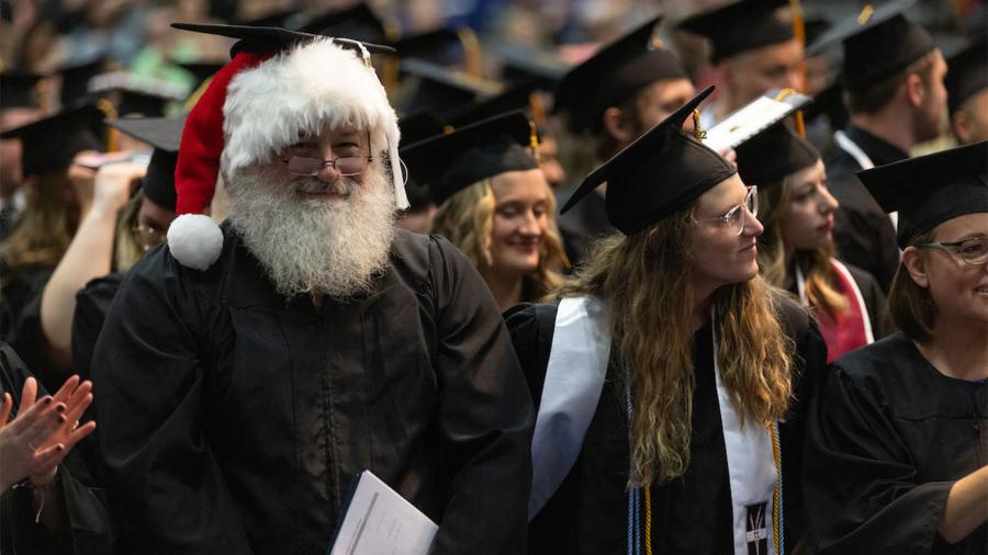 Graduate in a Santa hat
