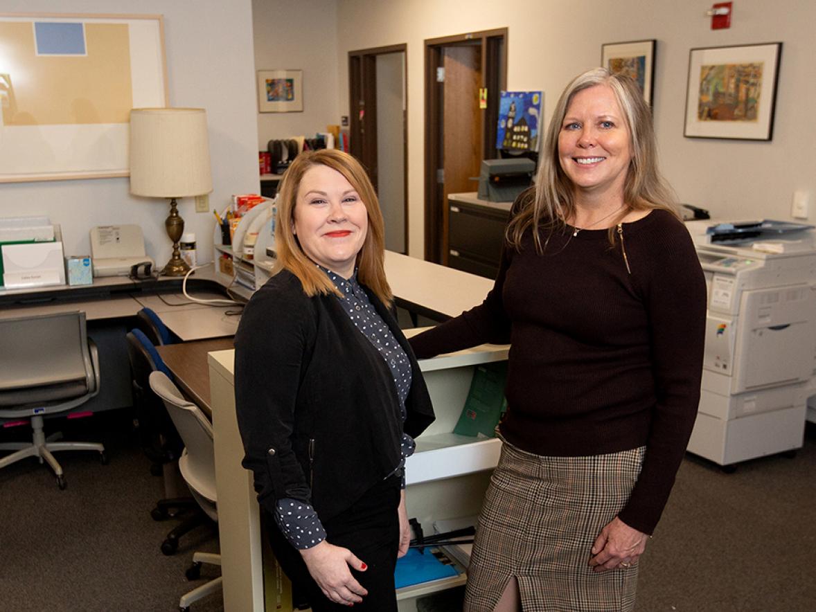 UW-Stout Director of Student Support Service and Fostering Success Angie Ruppe, at left, and Fostering Success program adviser Gail Mentzel in a photo taken last January, prior to COVID-19.