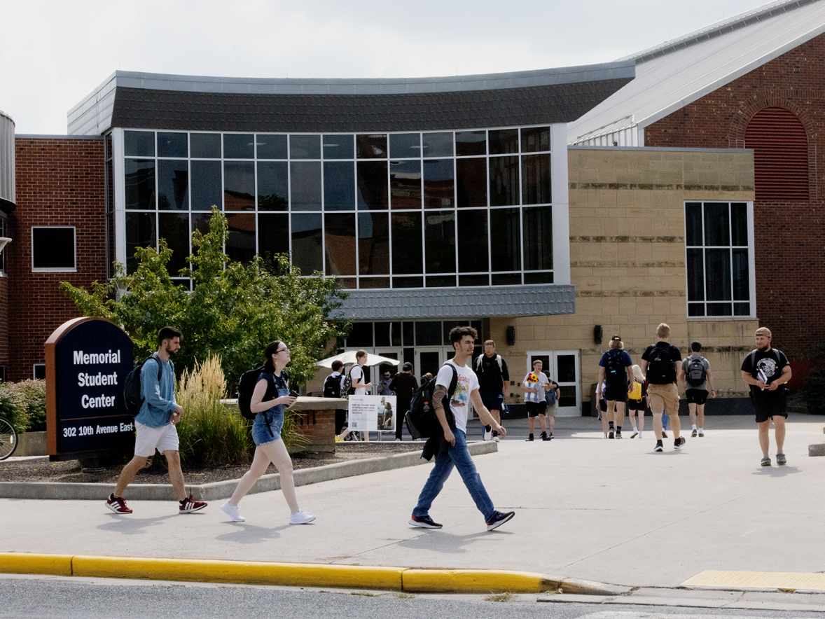 Students pass by the Memorial Student Center at UW-Stout.