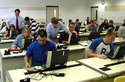 This room is designated for architectural drafting and design work with AutoCAD, along with lecture capabilities.